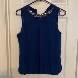 Blue blouse with stones around neck